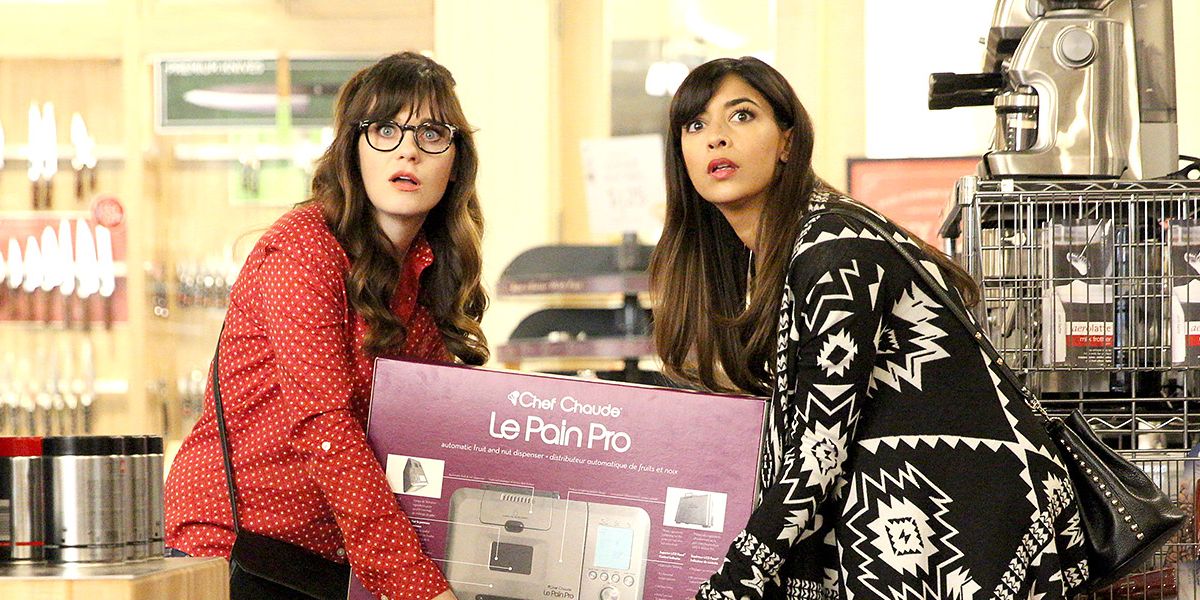 Jess and Cece stealing an appliance from a store.