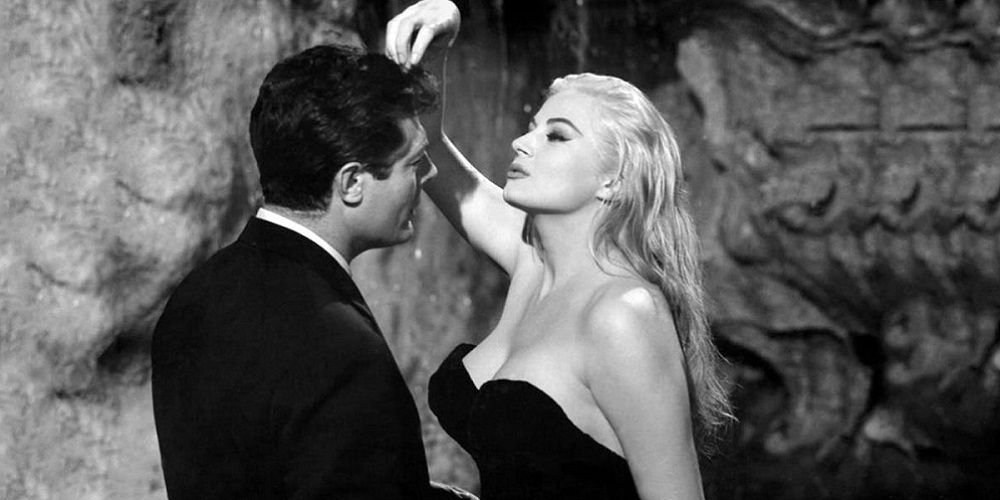 La Dolce Vita - Fellini - Marcello and Sylvia in the fountain; Sylvia sprinkles water on Marcello's head