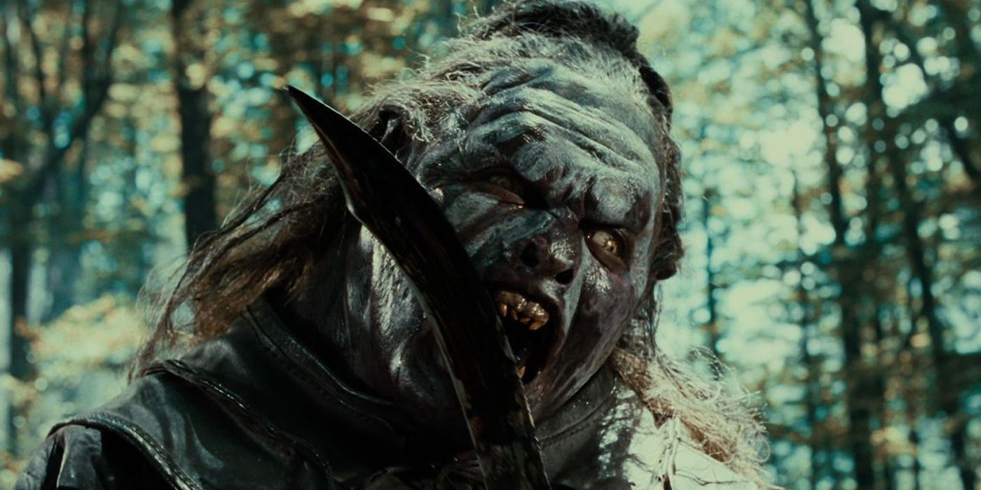 Lurtz from Lord of the Rings licking blood off his blade