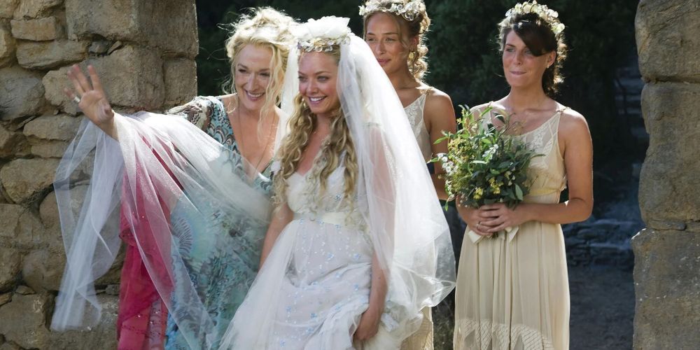Donna and Sophie prepare to walk down the aisle for Sophie's wedding in Mamma Mia!