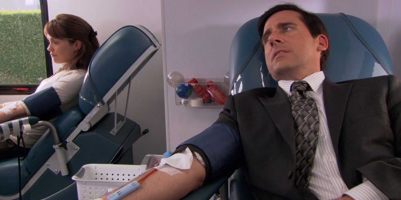 Michael Scott and Glove Girl giving blood from The Office
