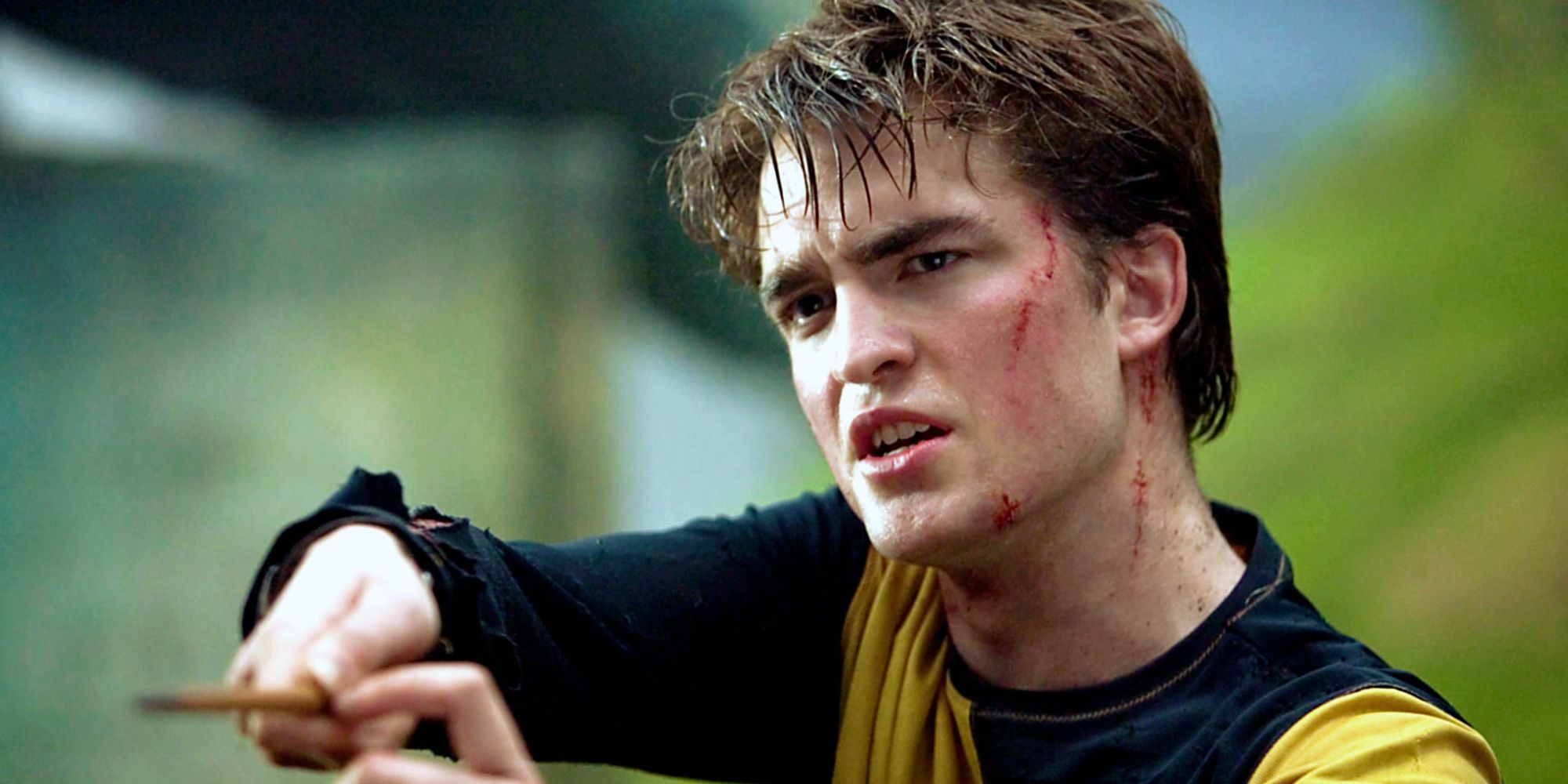 Robert Pattinson as Cedric Diggory In Harry Potter and the Goblet Of Fire Pointing Wand