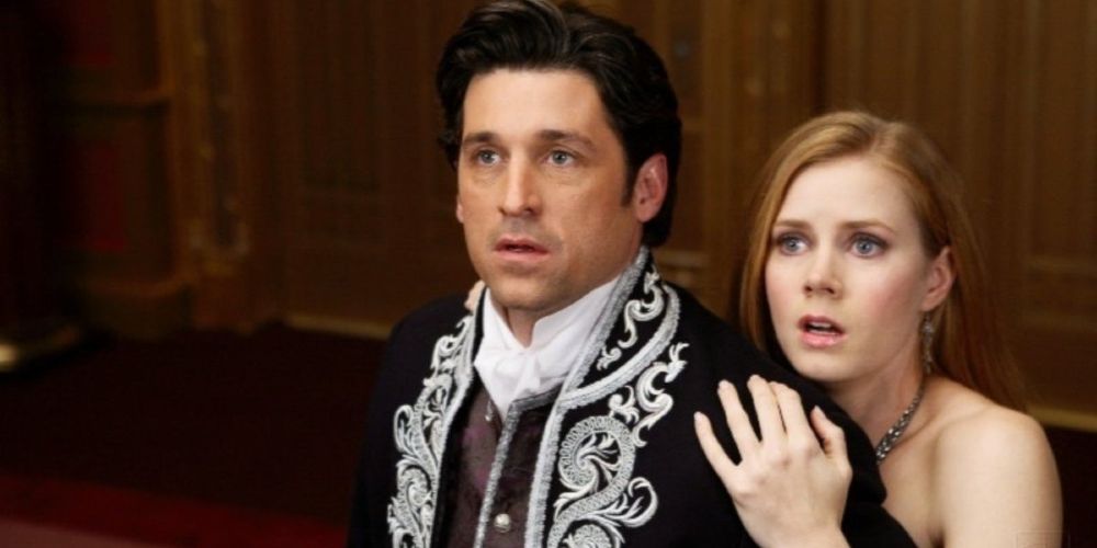 Robert Philip and Giselle in Enchanted, looking scared