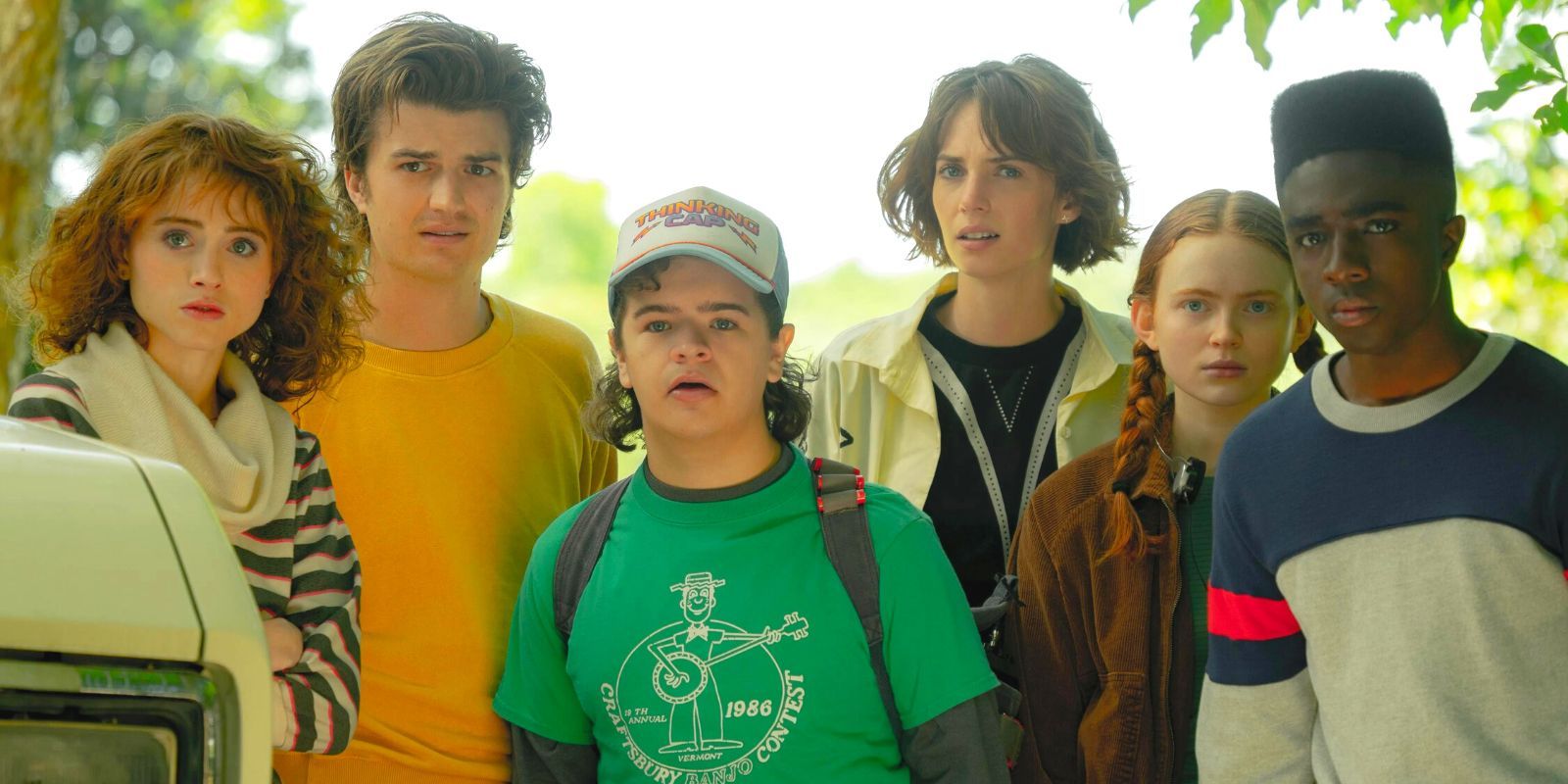 The cast of Stranger Things 4, including Dustin, Max, Steve and Lucas, looking concerned