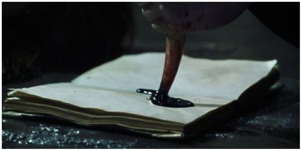The Basilisk's fang stabbing Tom Riddle's Diary in Harry Potter