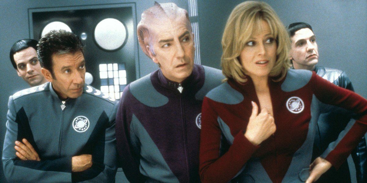 Tim Allen looks on with castmates on the set of Galaxy Quest