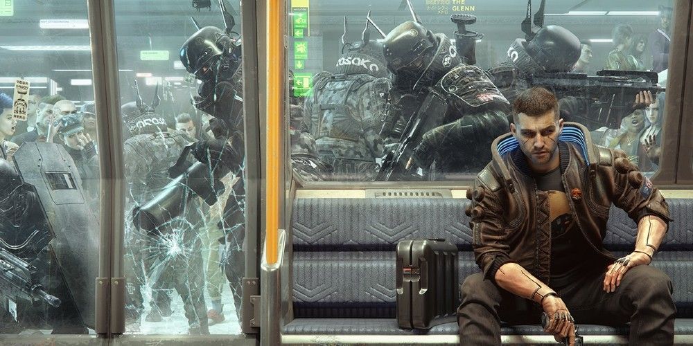 V sits in a subway train in Cyberpunk 2077