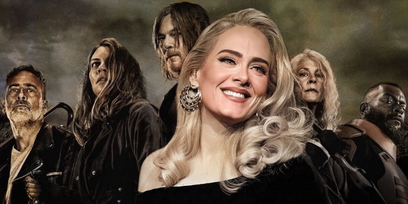 Adele smiling in front of sullen-looking cast members of The Walking Dead.