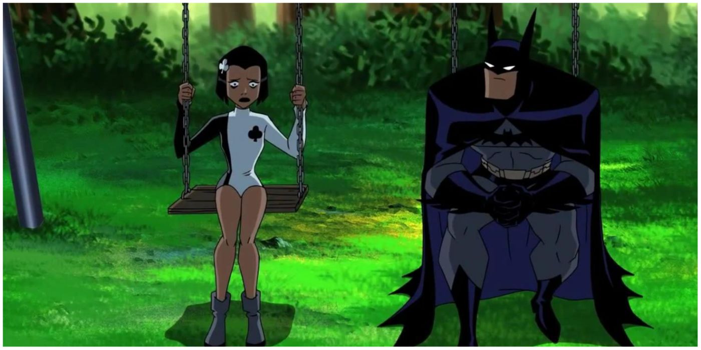 Batman and Ace sitting on a swing set in Justice League Unlimited