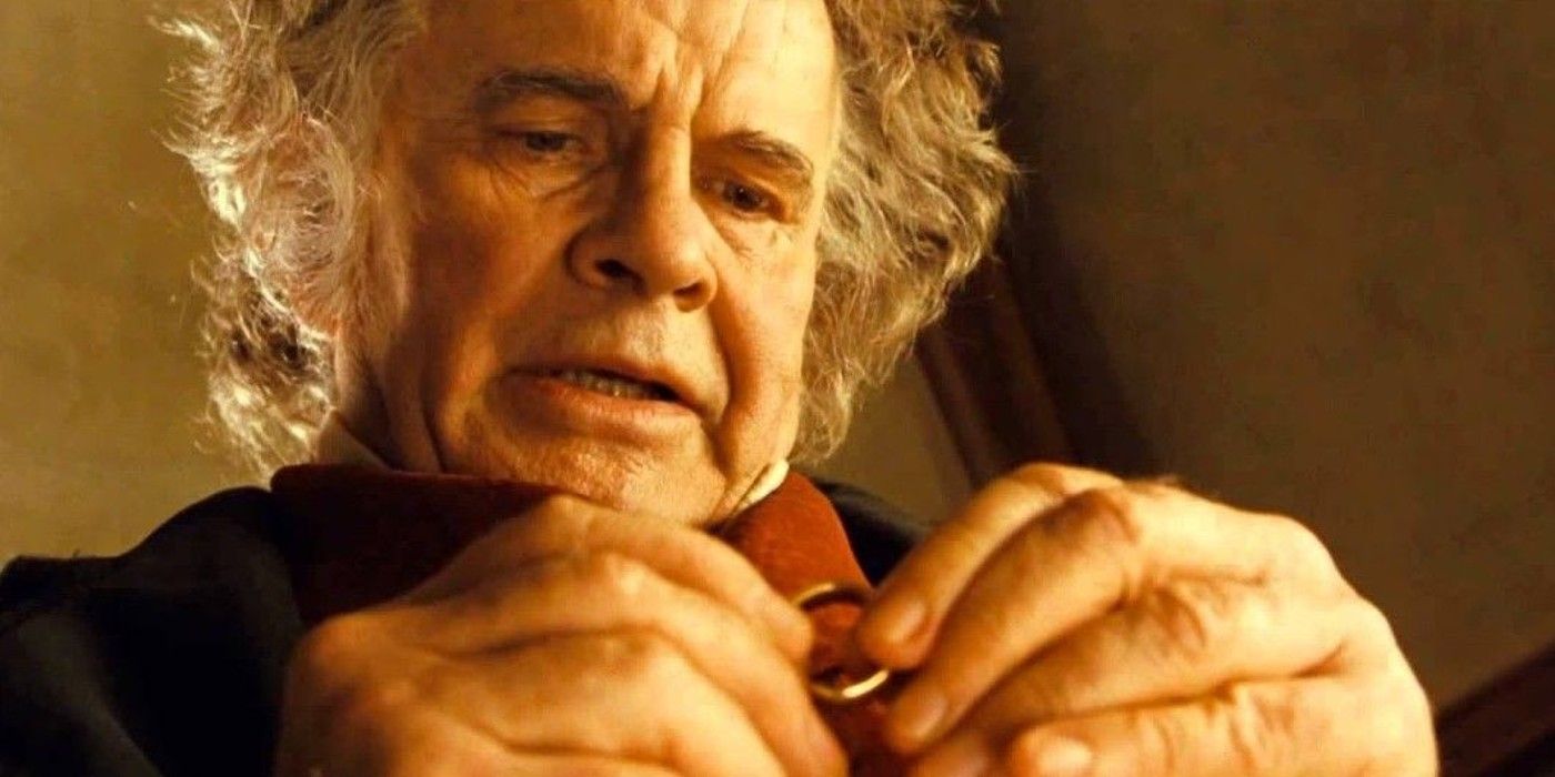 Bilbo holding the One Ring as he speaks to Gandalf in The Fellowship of the Ring