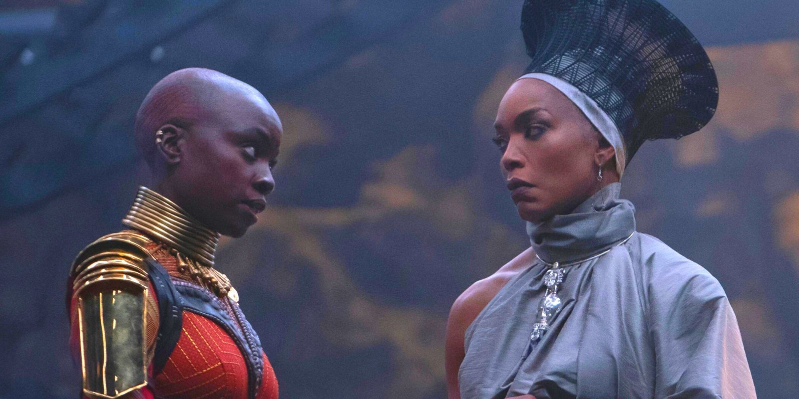 Queen Ramonda and Okoye sharing a tense moment in Black Panther: Wakanda Forever