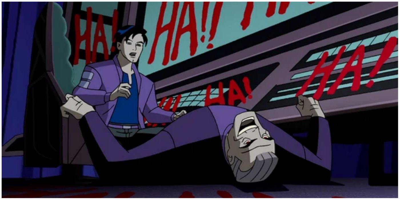 Bruce Wayne laughing on the ground with Terry McGinnis looking at him in fear in Return of the Joker