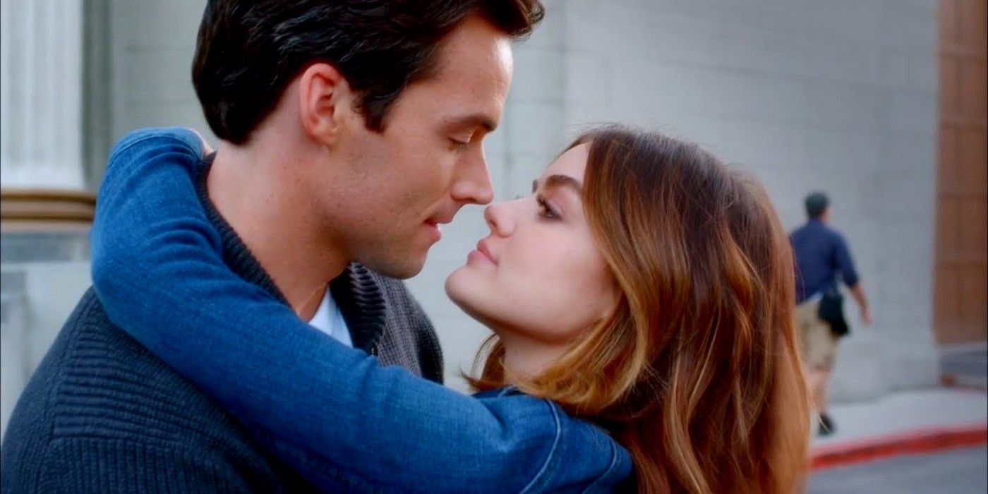 Ezra and Aria embracing in an episode of Pretty Little Liars