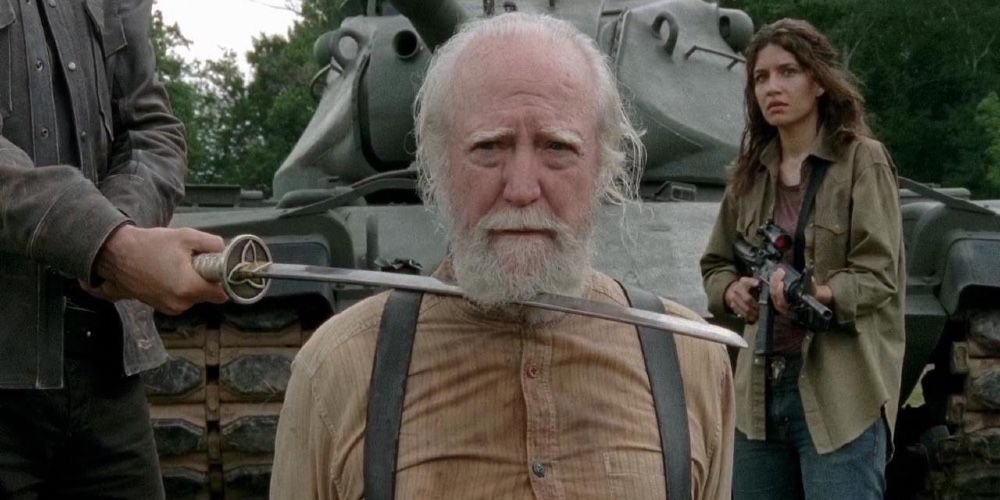 Herschel Greene is held prisoner with a sword held against his neck in ``The Walking Dead.''
