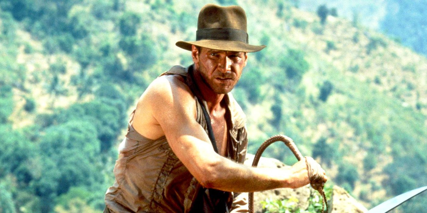 Indy wielding his whip and a sword in Temple of Doom