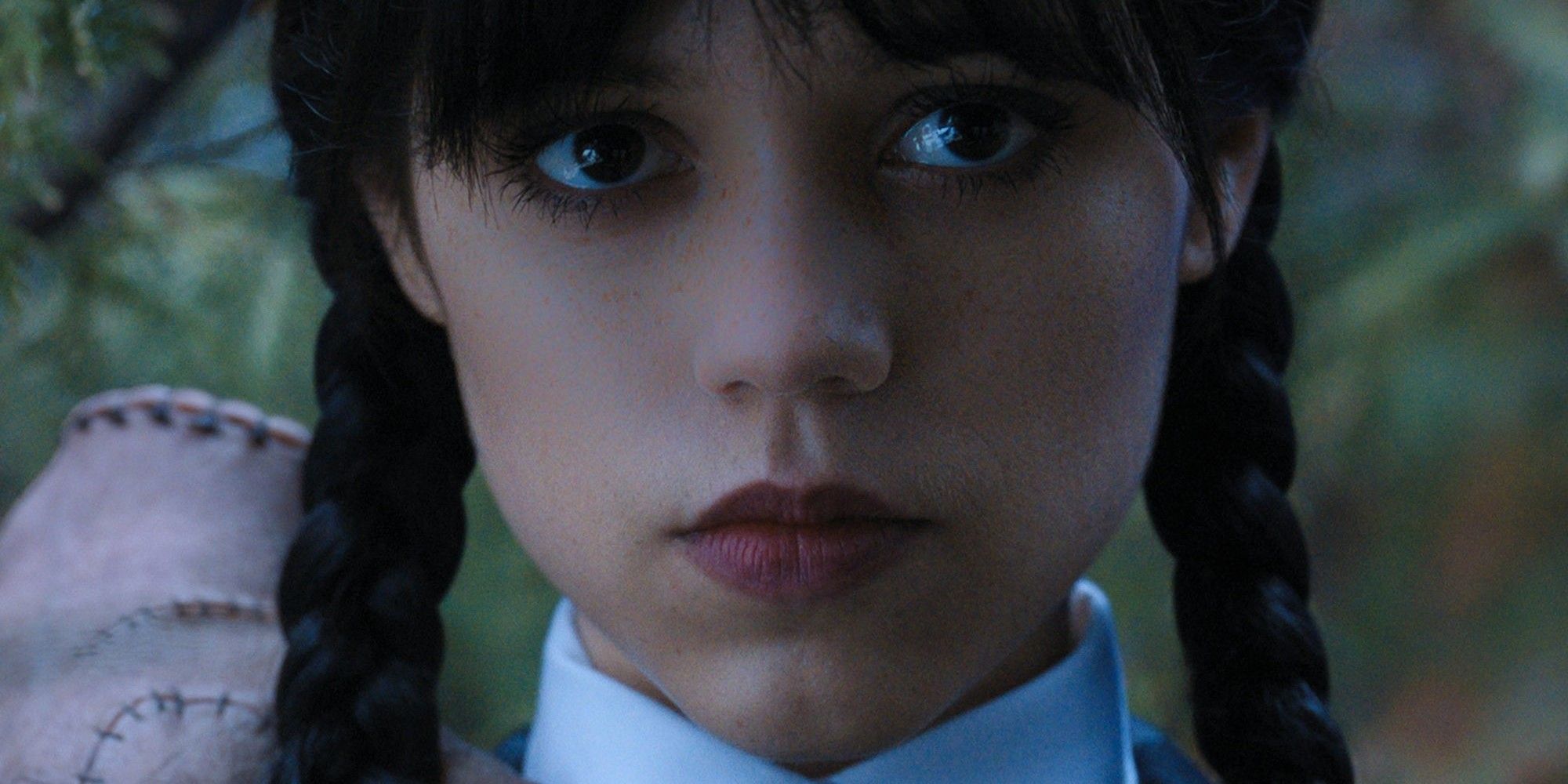 Closeup of Jenna Ortega in Tim Burton's Wednesday.