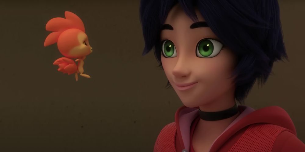 Marc olhando para o Miraculous do Galo de Miraculous Ladybug