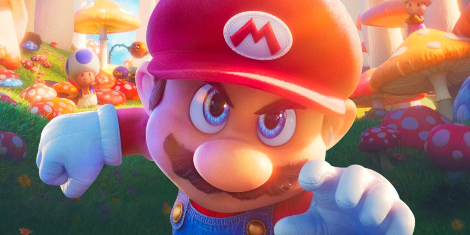 Mario with a clenched fist and a determined face rushing the camera