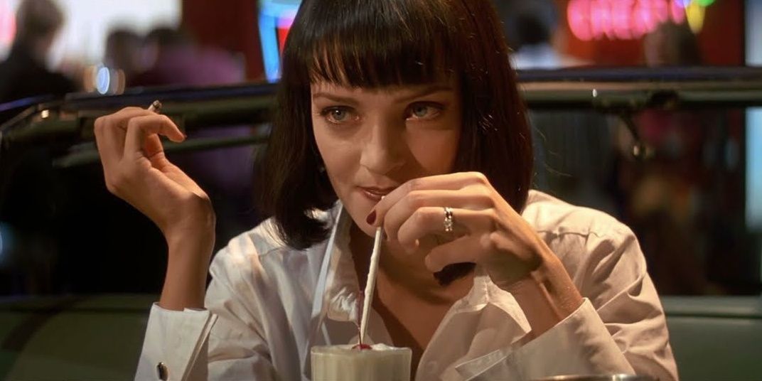 Mia Wallace drinks a milkshake in Pulp Fiction