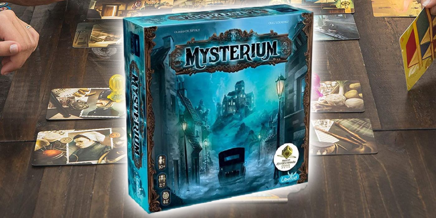 The box for the board game mysterium, superimposed over a game in progress