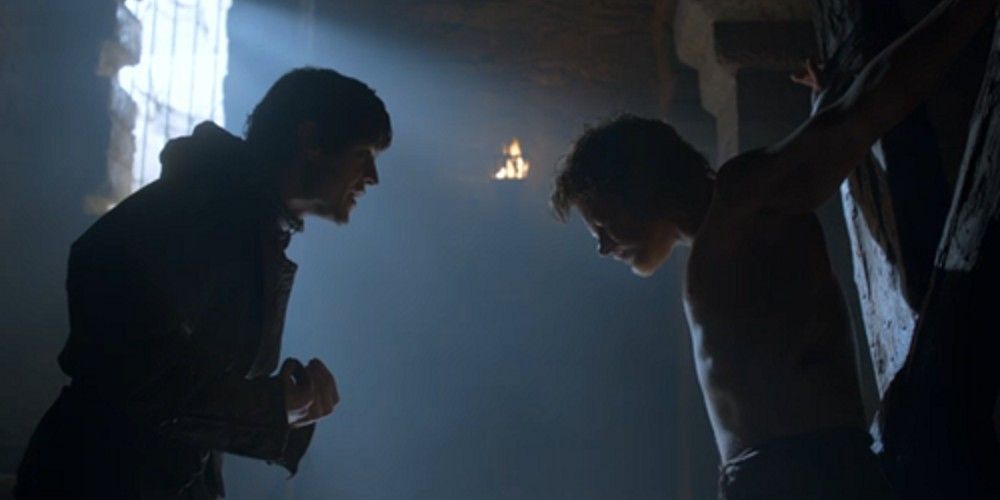 Ramsay Bolton tortures Theon Greyjoy in Game of Thrones.