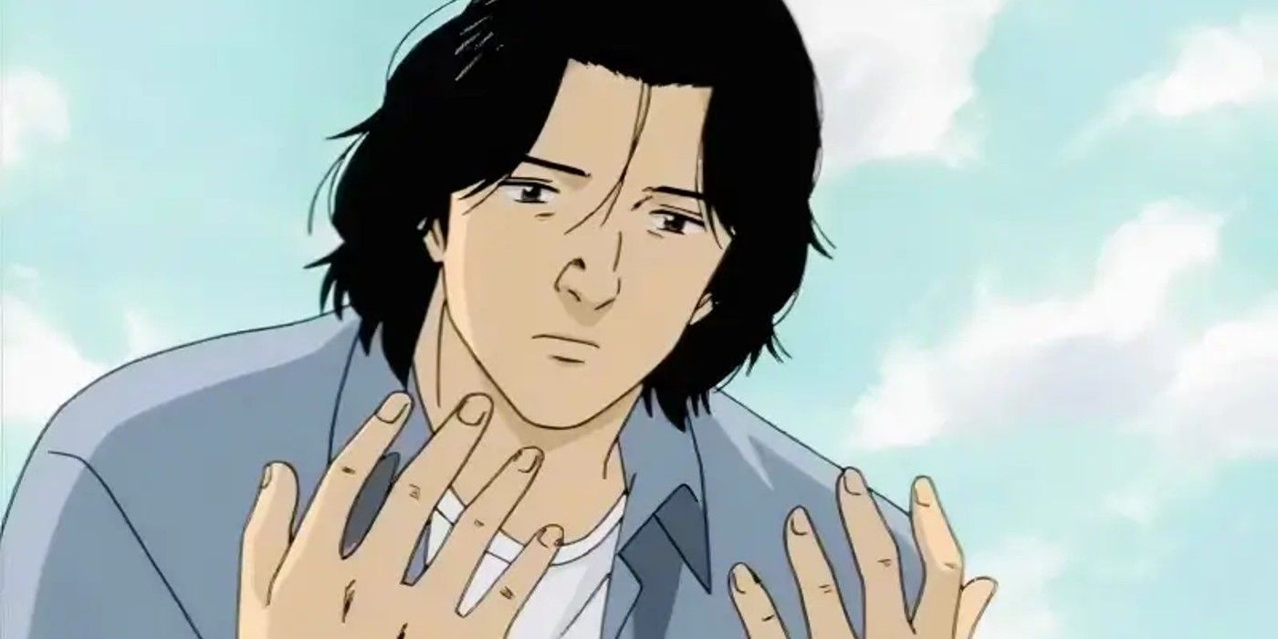 Kenzo Tenma reflects on his actions in Monster anime while looking at his hands.