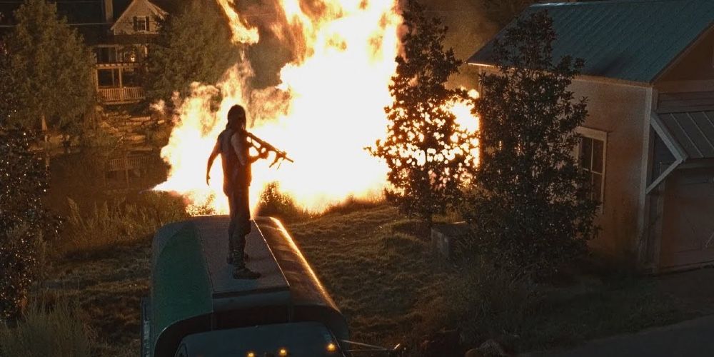 Daryl ateando fogo durante a batalha por Alexandria