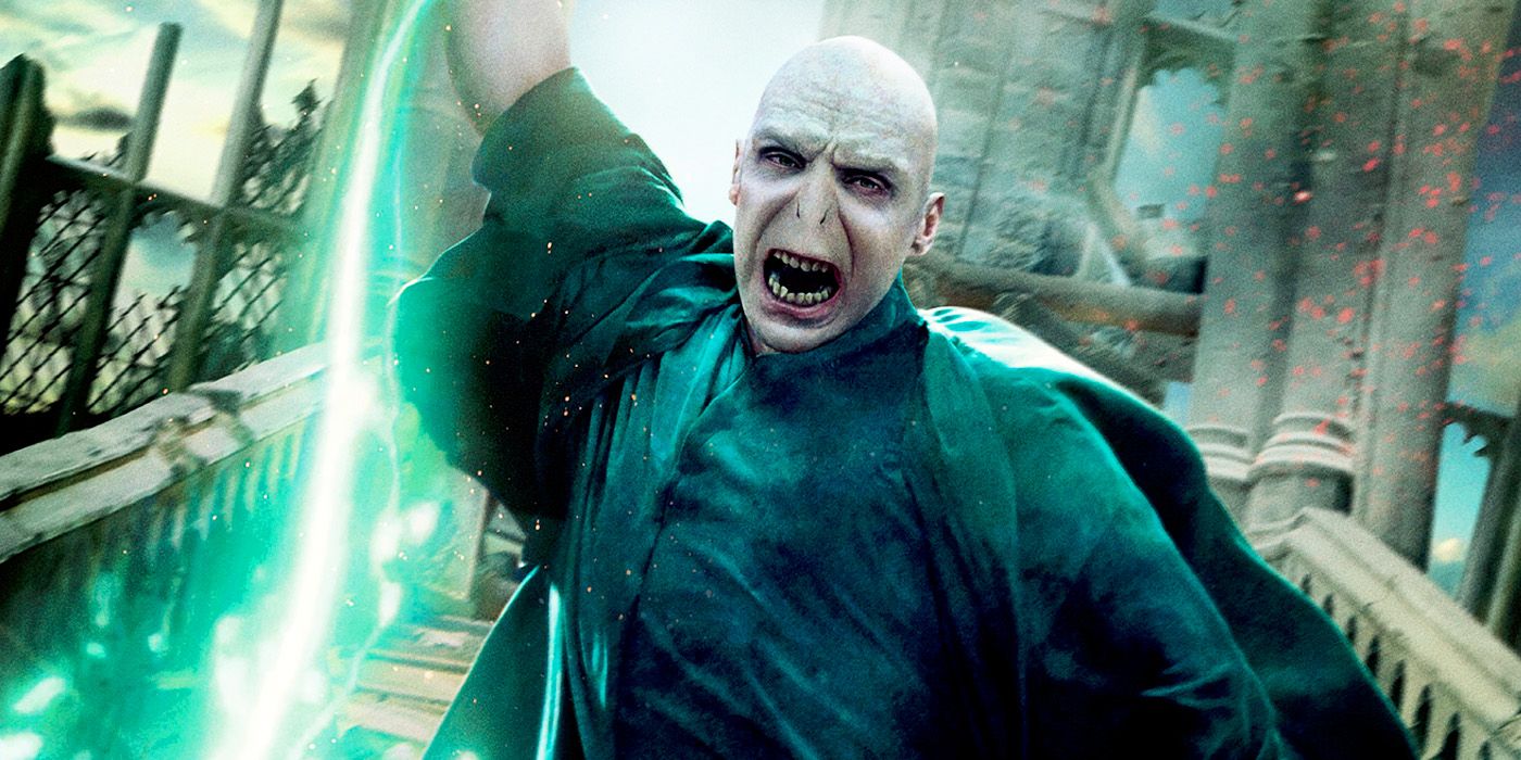 Ralph Fiennes as Voldemort shoots a green spell from his wand in Harry Potter and the Deathly Hallows Part 2.