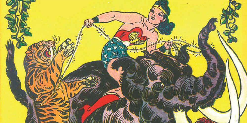 Wonder Woman fighting a sabretooth tiger in DC Comics