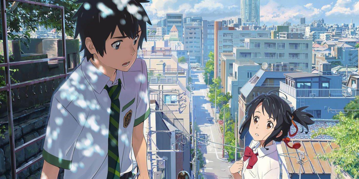 Mitsuha and Taki talking in the city in Your Name.