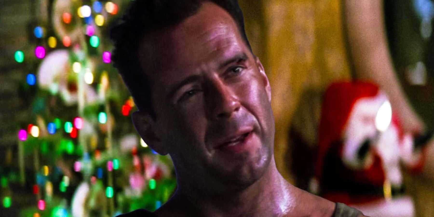 John McClane standing in front of the christmas tree