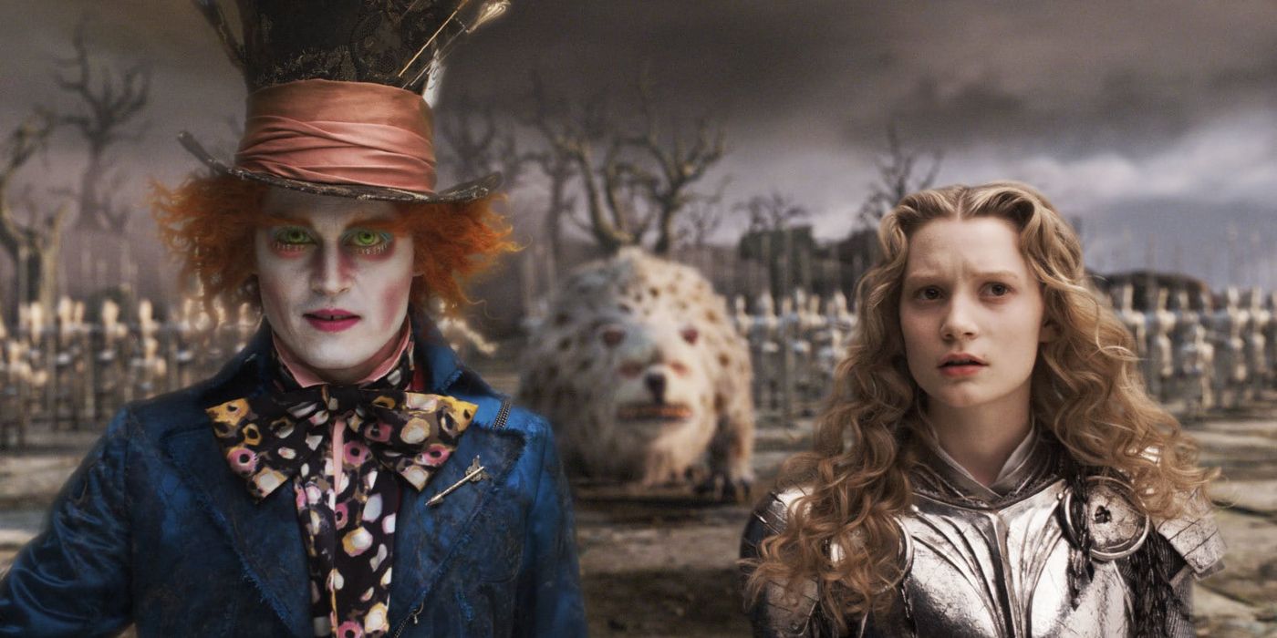 Alice and Mad Hatter stand together in Alice In Wonderland
