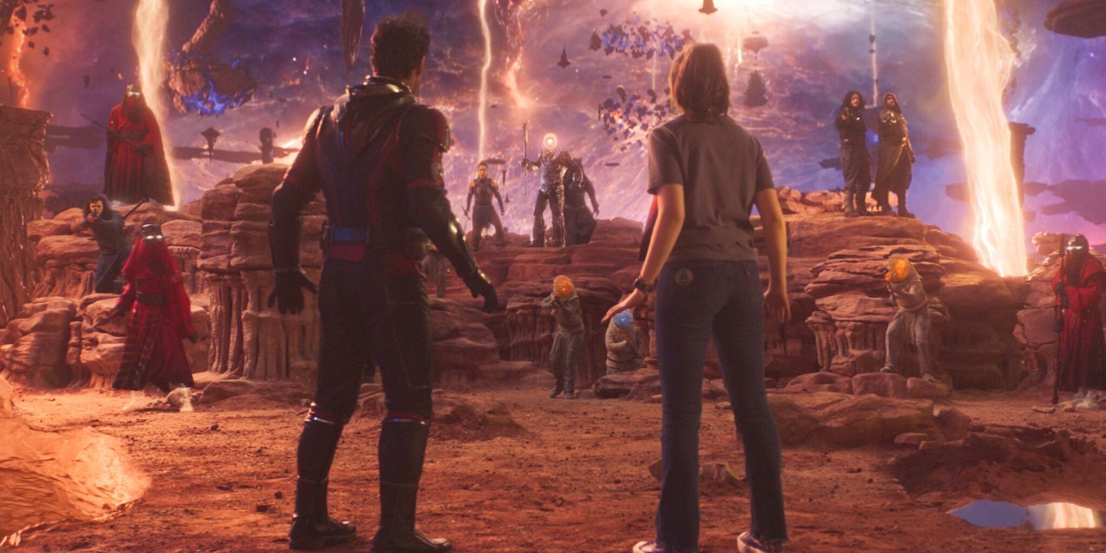 Ant-Man and Cassie Lang stand in away at the Quantum Realm's denizens.