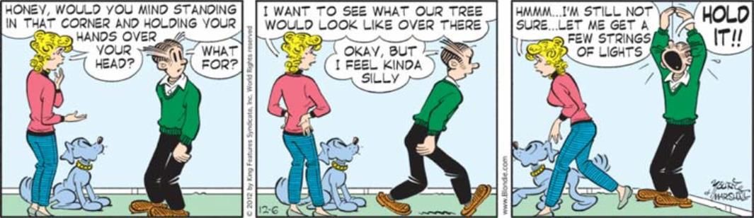 Blondie asks Dagwood to pose as a Christmas tree in comic strips