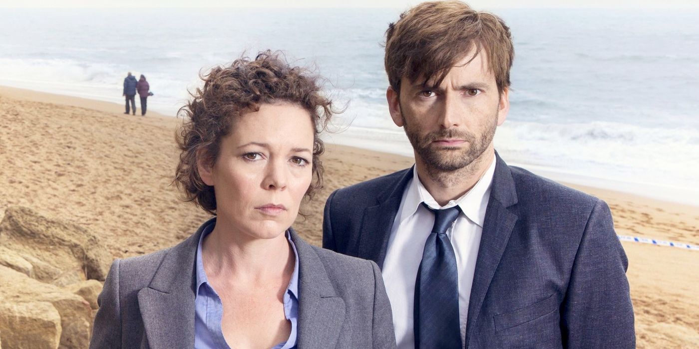 Olivia Colman as Ellie Miller and David Tennant as Alec Hardy stand together in ITV's Broadchurch