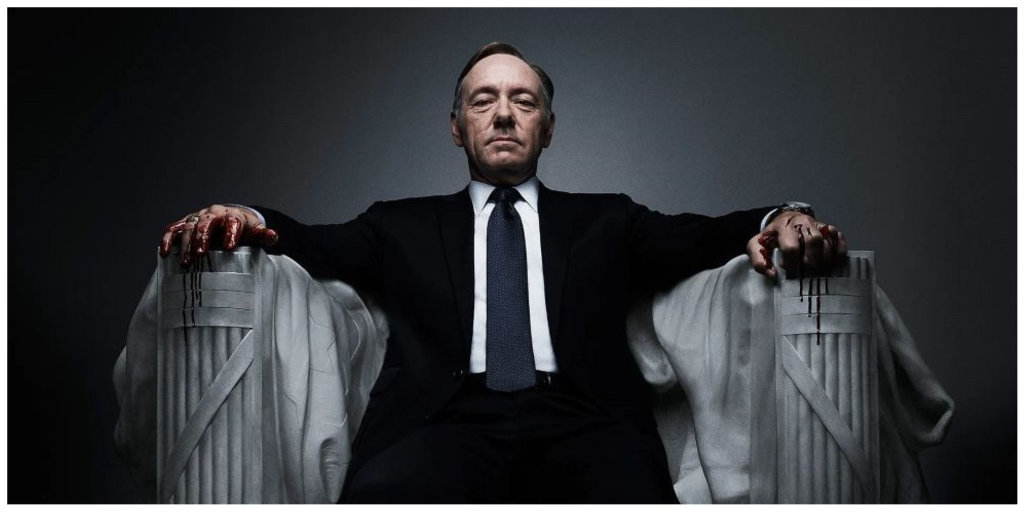 Kevin Spacey as Frank Underwood sitting in House Of Cards poster 