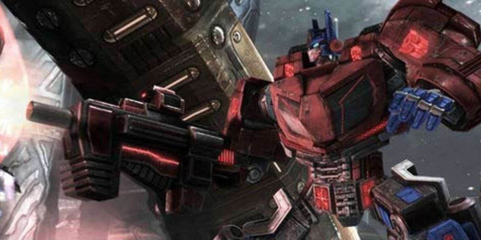 Optimus Prime firing his blaster in Transformers: War for Cybertron