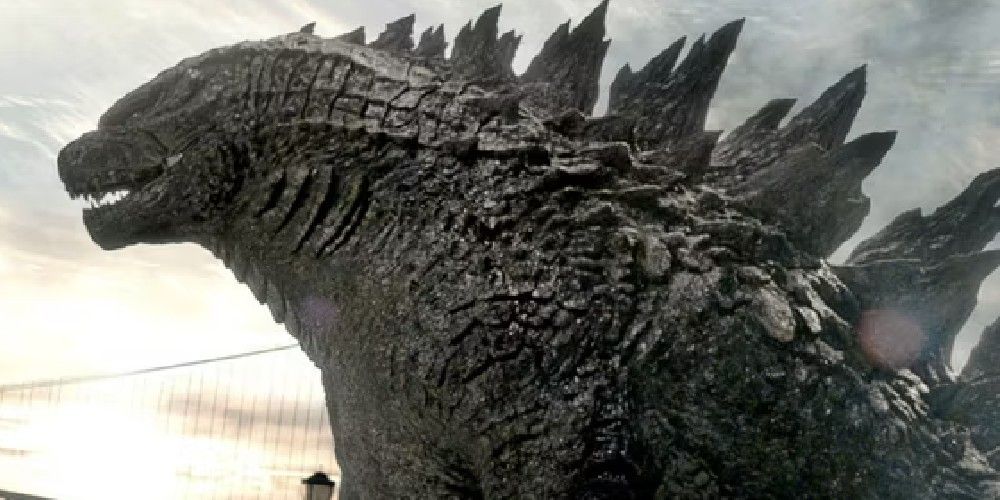 Godzilla lumbers towards the ocean in Godzilla (2014)