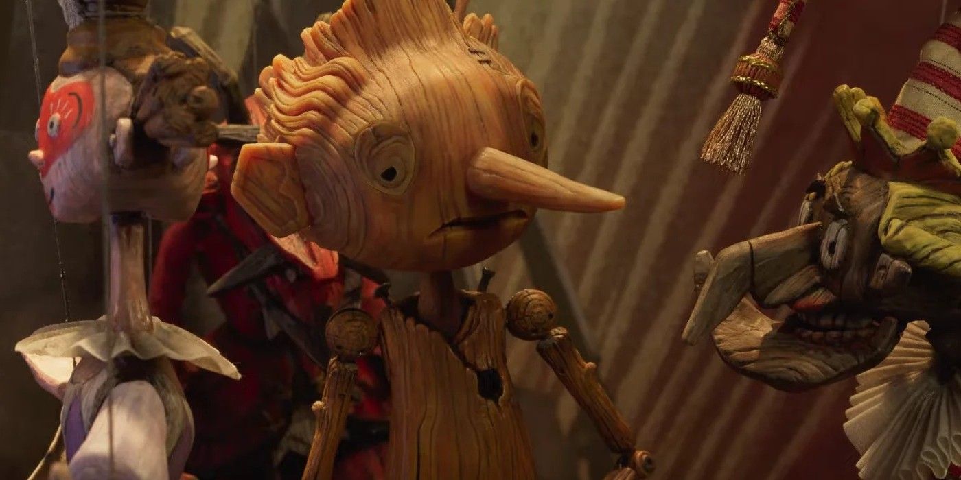 Pinocchio talks to other puppets in Guillermo del Toro's Pinocchio