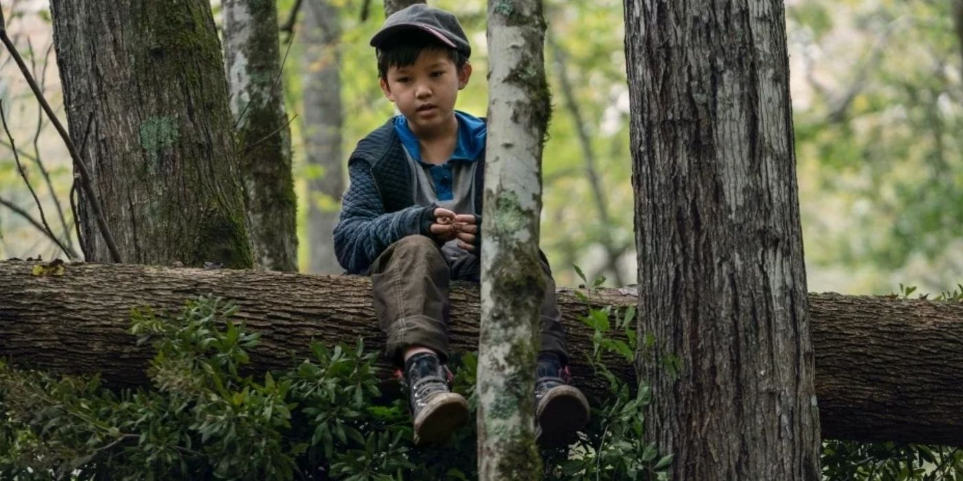 Hershel up in a tree in The Walking Dead. 