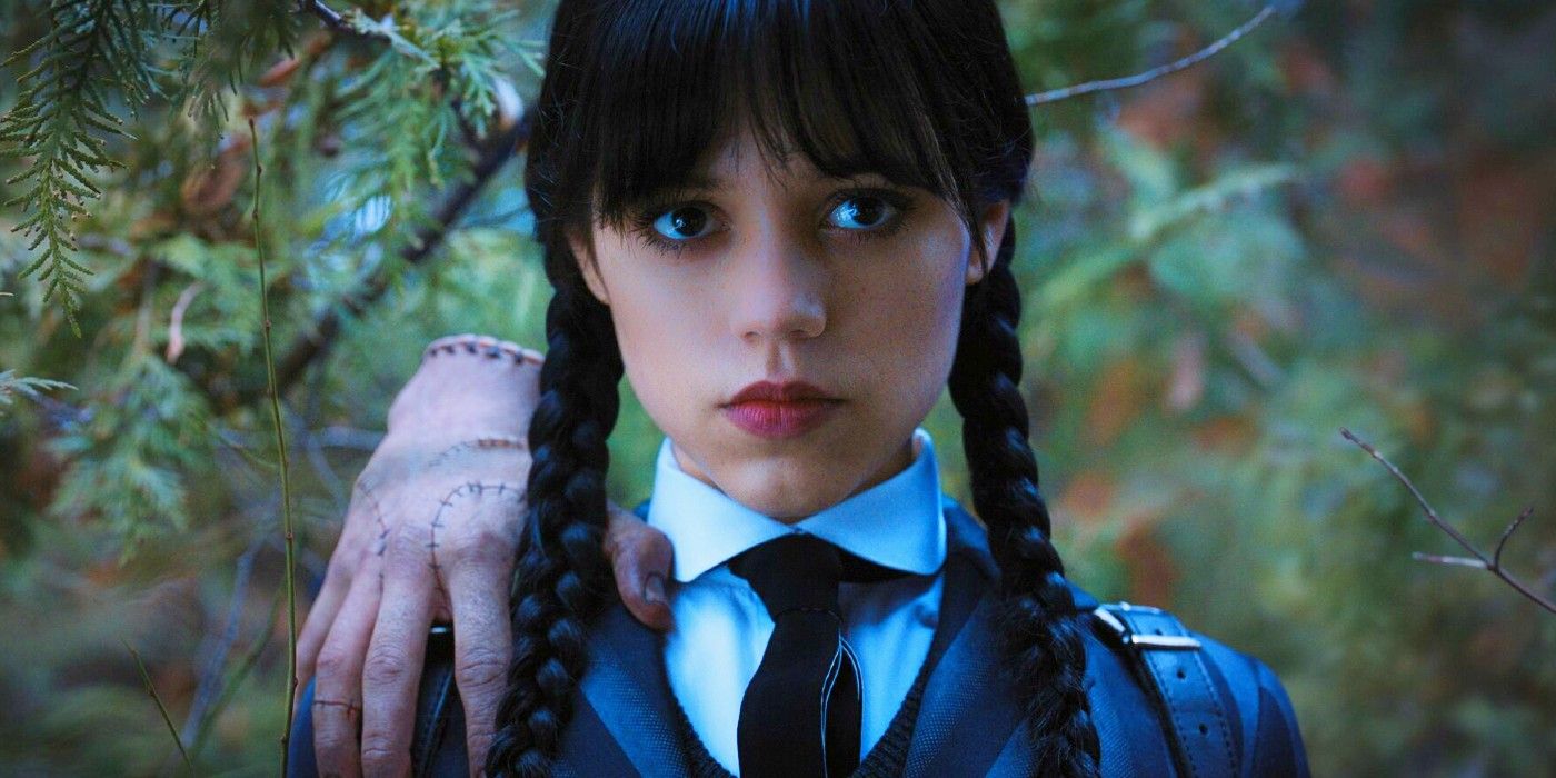 Jenna Ortega as Wednesday with Thing on her shoulder