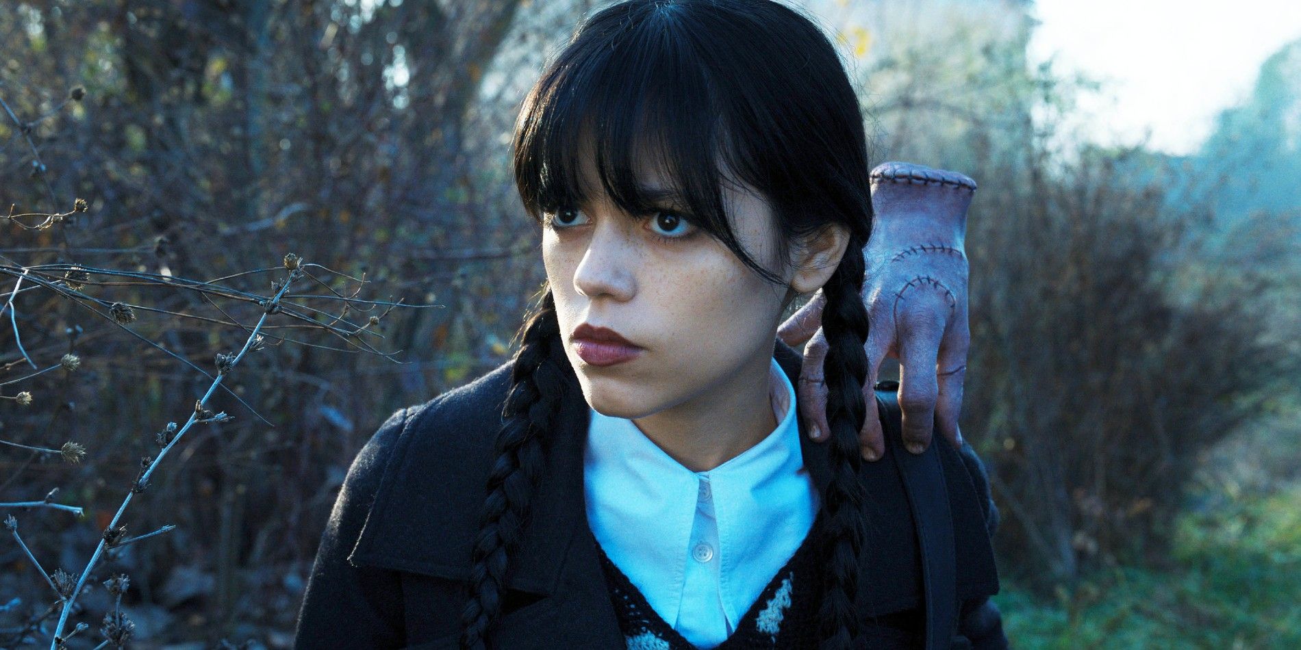 Jenna Ortega as Wednesday and Thing in Netflix's Wednesday