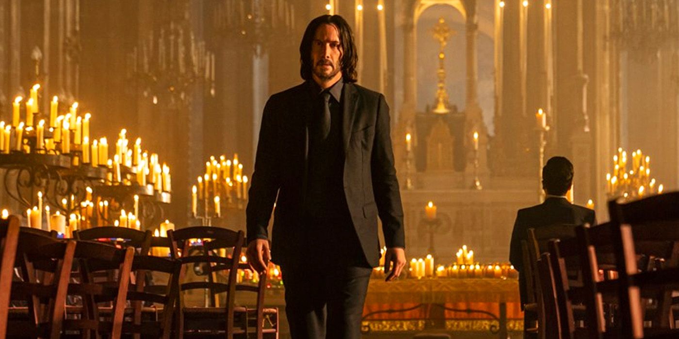 John Wick: Chapter 4: Keanu Reeves's John walking down the aisle of a candle-lit church.