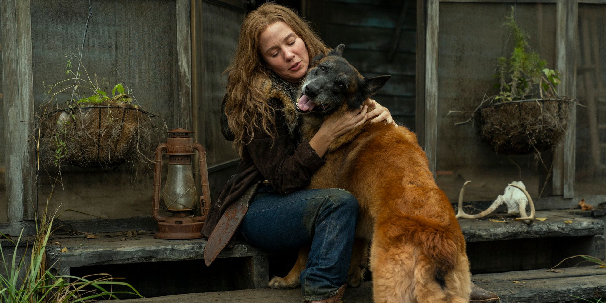Leah being greeted by Dog on her front porch in The Walking Dead