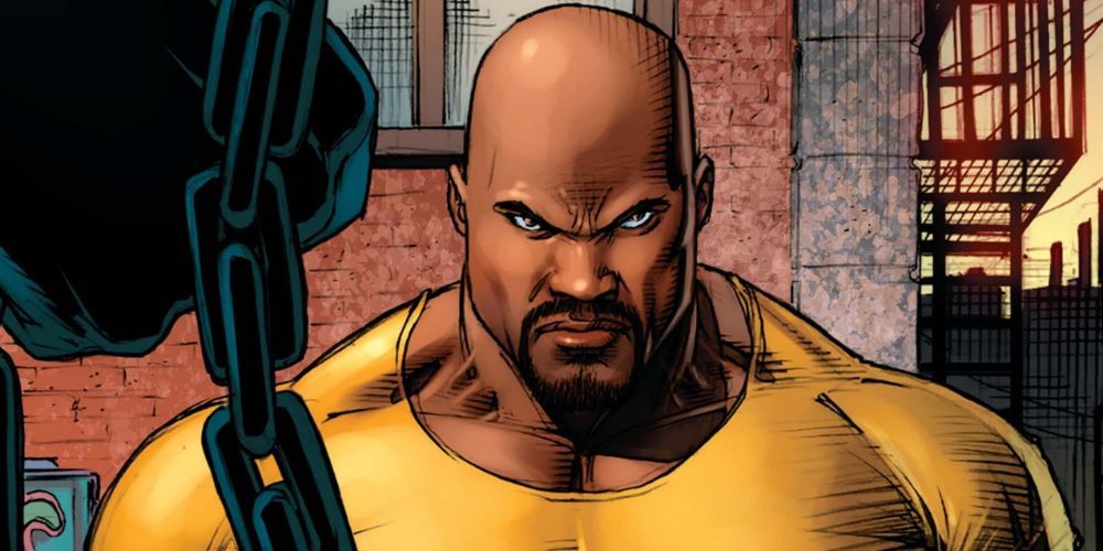 Luke Cage scowls at an opponent with a chain in Marvel Comics