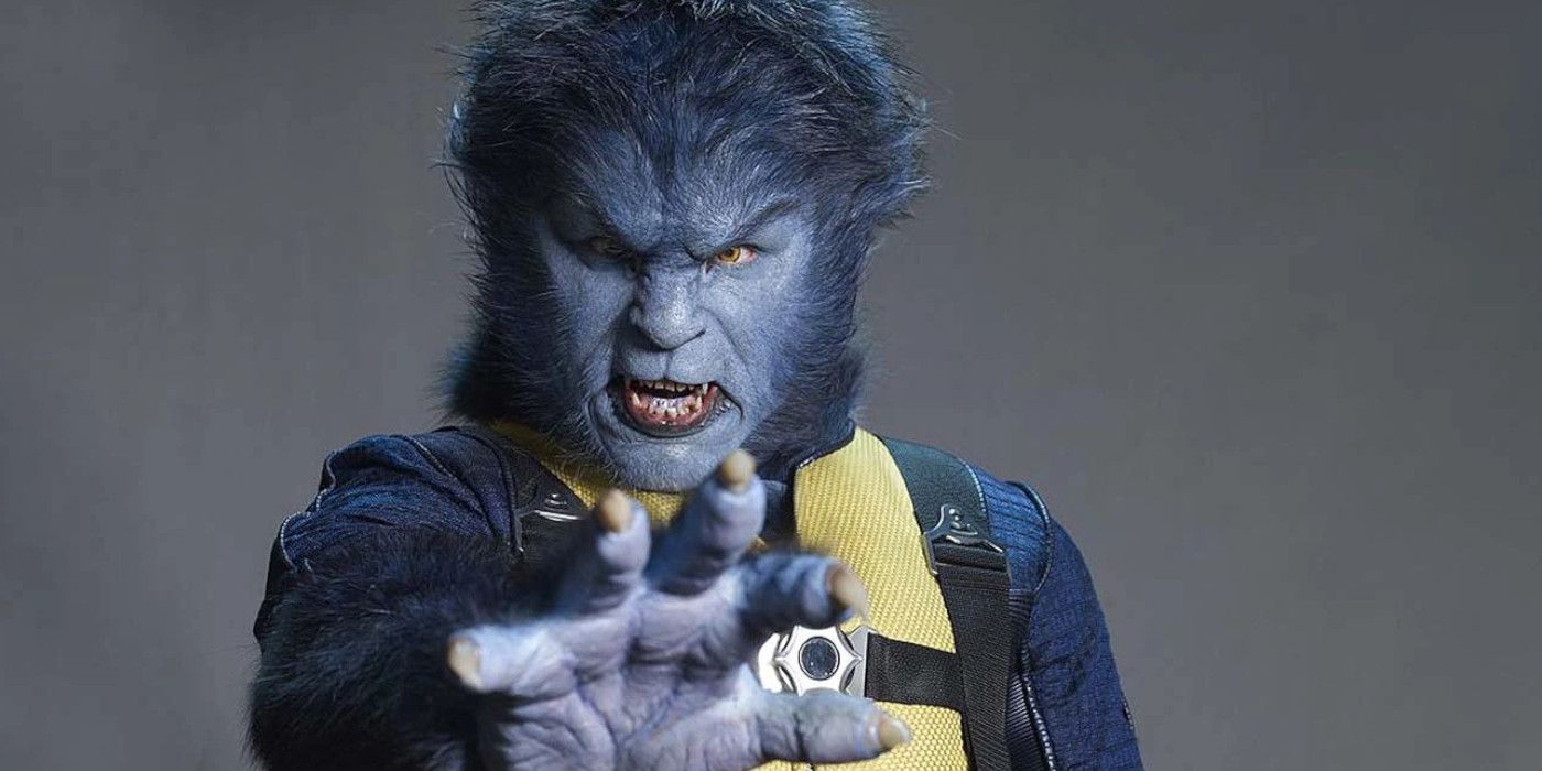 X-Men's Nicholas Hoult as Beast reaching a hand toward the camera.