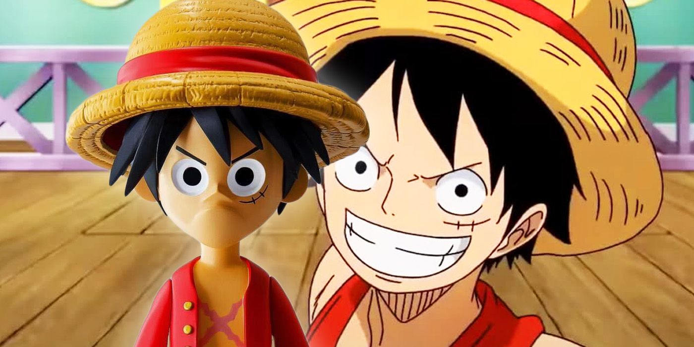 One Piece's Luffy behind a vinyl figure of himself.