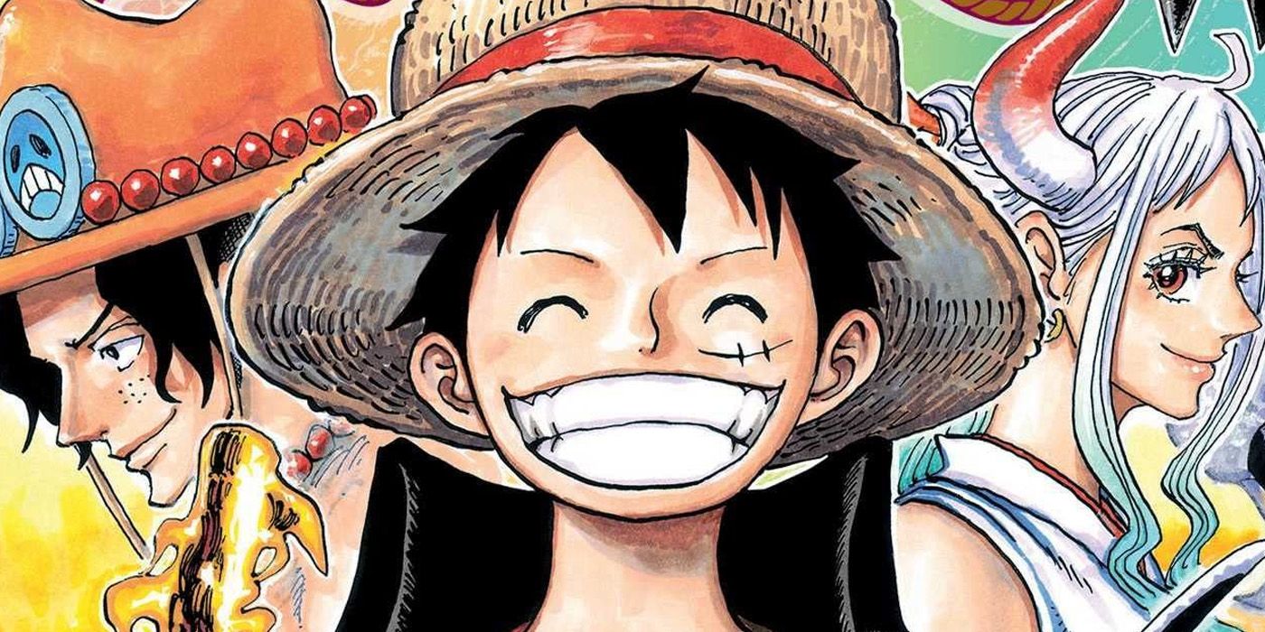The official cover of a One Piece manga featuring Luffy grinning in the center