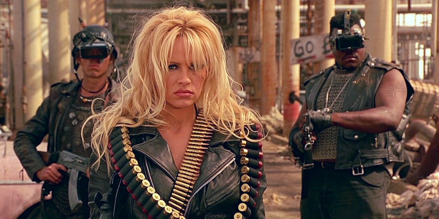Pamela Anderson as Bird Wire, club owner and bounty hunter