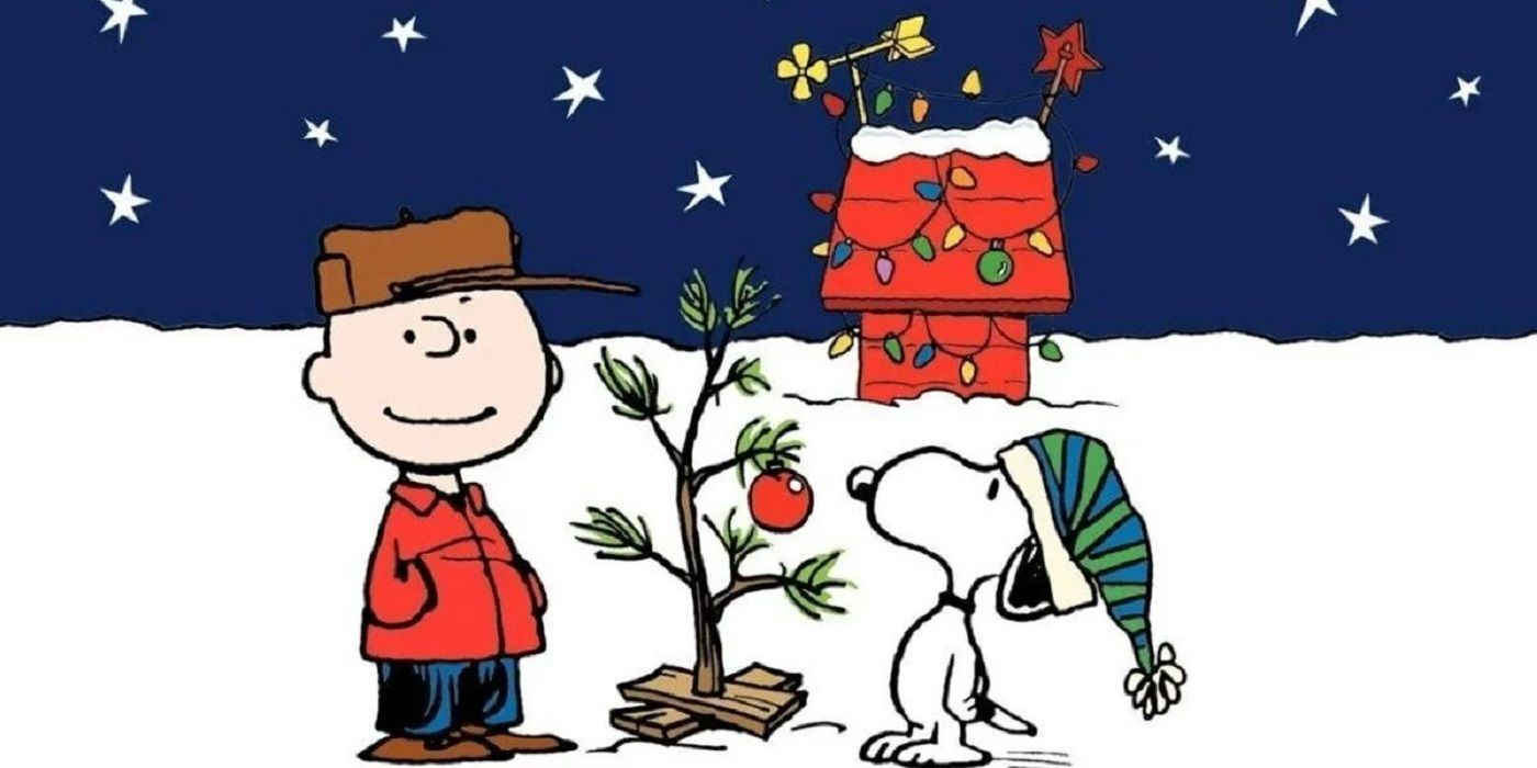 A Peanuts christmas comic strip where Charlie Brown and Snoopy decorate a dead tree